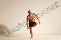 Underwear Gymnastic poses Man Black Muscular Bald Dancing Dynamic poses Academic